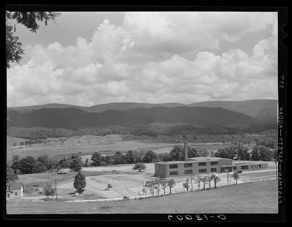 Tygart Valley Homesteads, Elkins vicinity, West Virginia. New school and community center at right. Sourced from the Library…