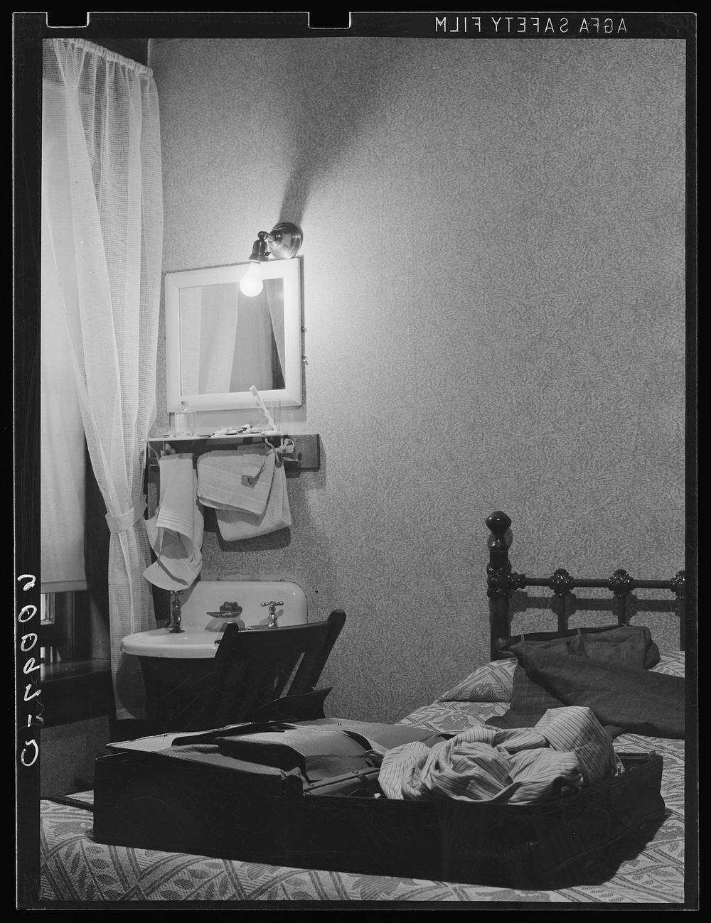Hotel bedroom. Elkins, West Virginia. Sourced from the Library of Congress.