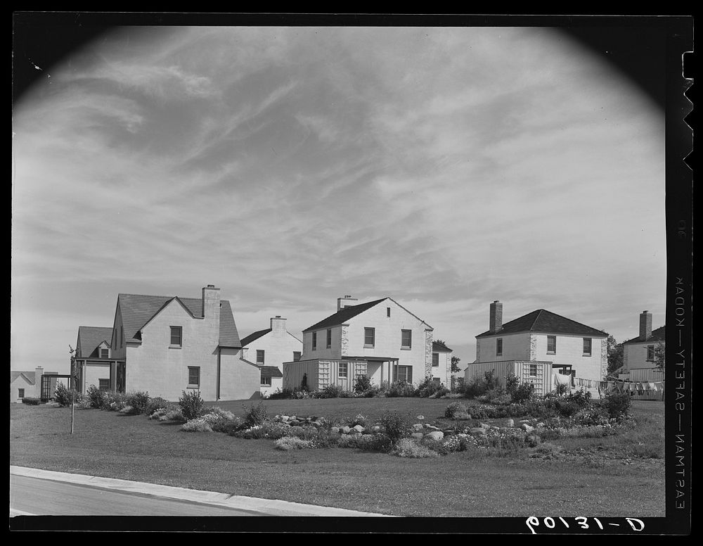 Group of homes with rock garden. Sourced from the Library of Congress.