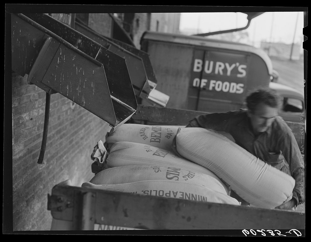 [Untitled photo, possibly related to: Loading truck with daily supply of flour for local bakery. Minneapolis, Minnesota].…