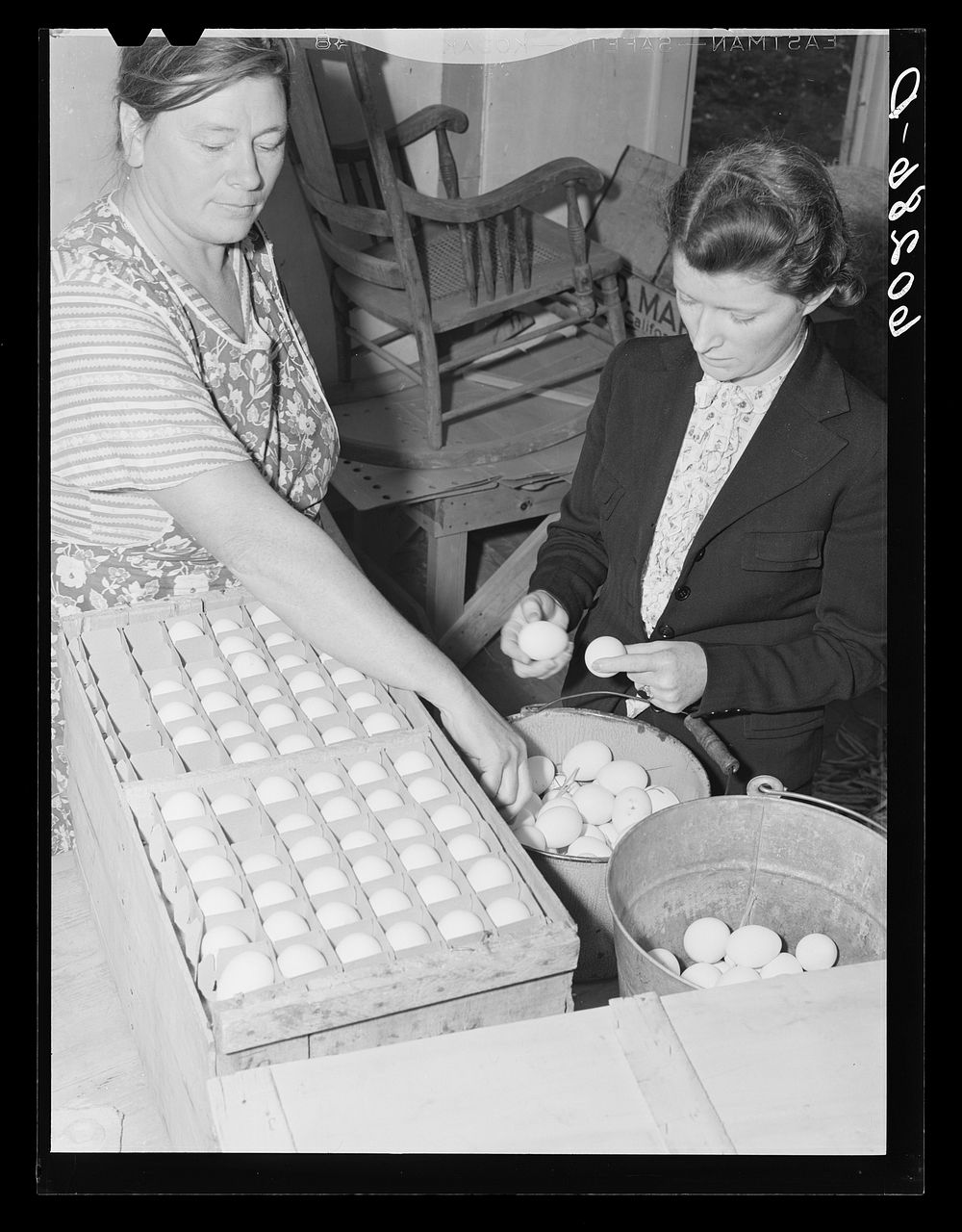 FSA (Farm Security Administration) home supervisor with wife of rehabilitation borrower. Chippewa County, Wisconsin. Sourced…