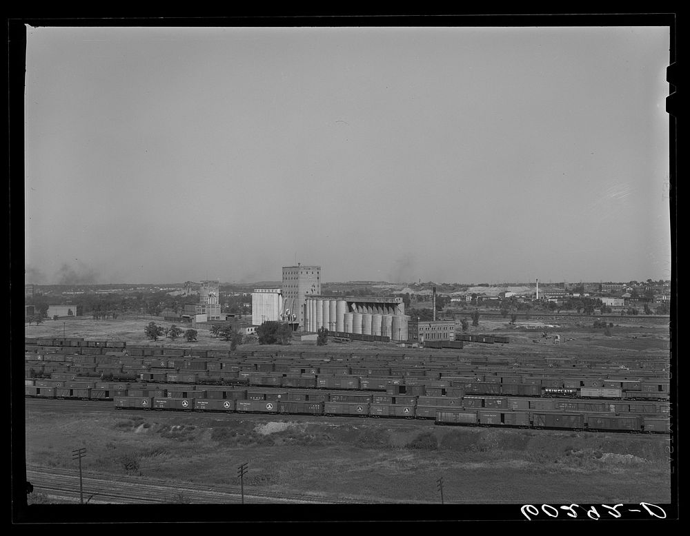 Freight cars and grain elevators. Minneapolis, Minnesota. Sourced from the Library of Congress.