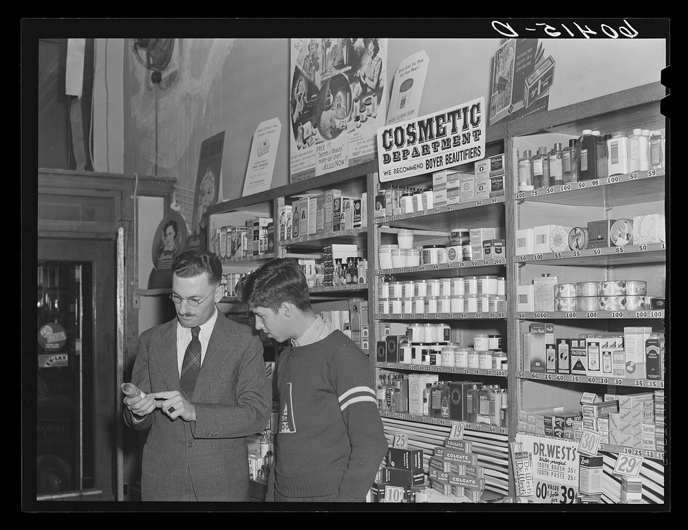 High school boy talking to druggist. Graceville, Minnesota. Sourced from the Library of Congress.