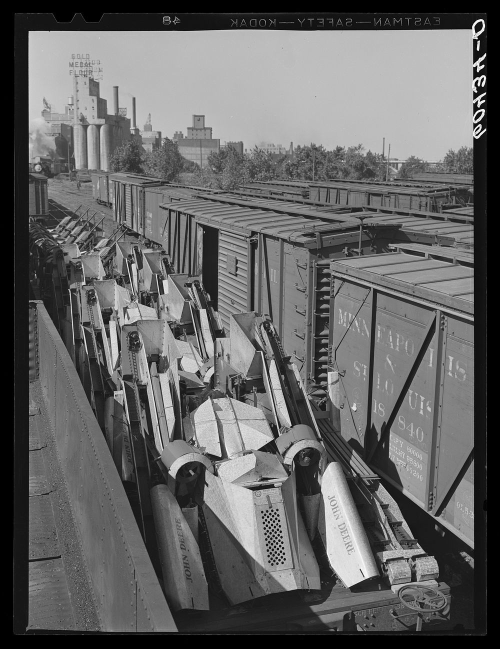 Corn shuckers loaded on freight cars. Minneapolis, Minnesota. Sourced from the Library of Congress.