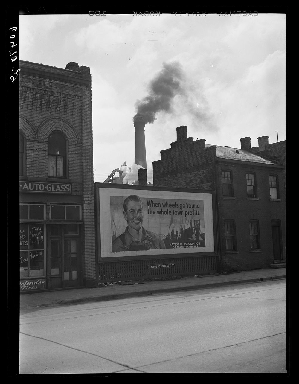 Dubuque's largest industry in background: sash and door company. Employs 1,500 men during peak. Dubuque, Iowa. Sourced from…