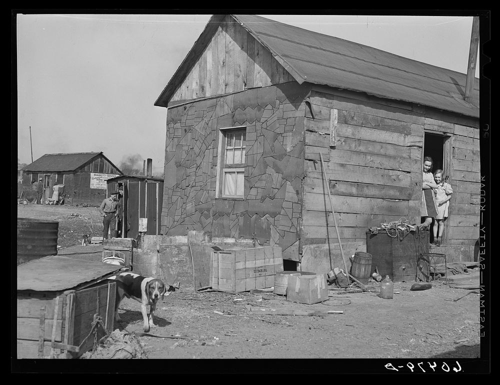 Home in river bottom shacktown. Dubuque, Iowa. Sourced from the Library of Congress.