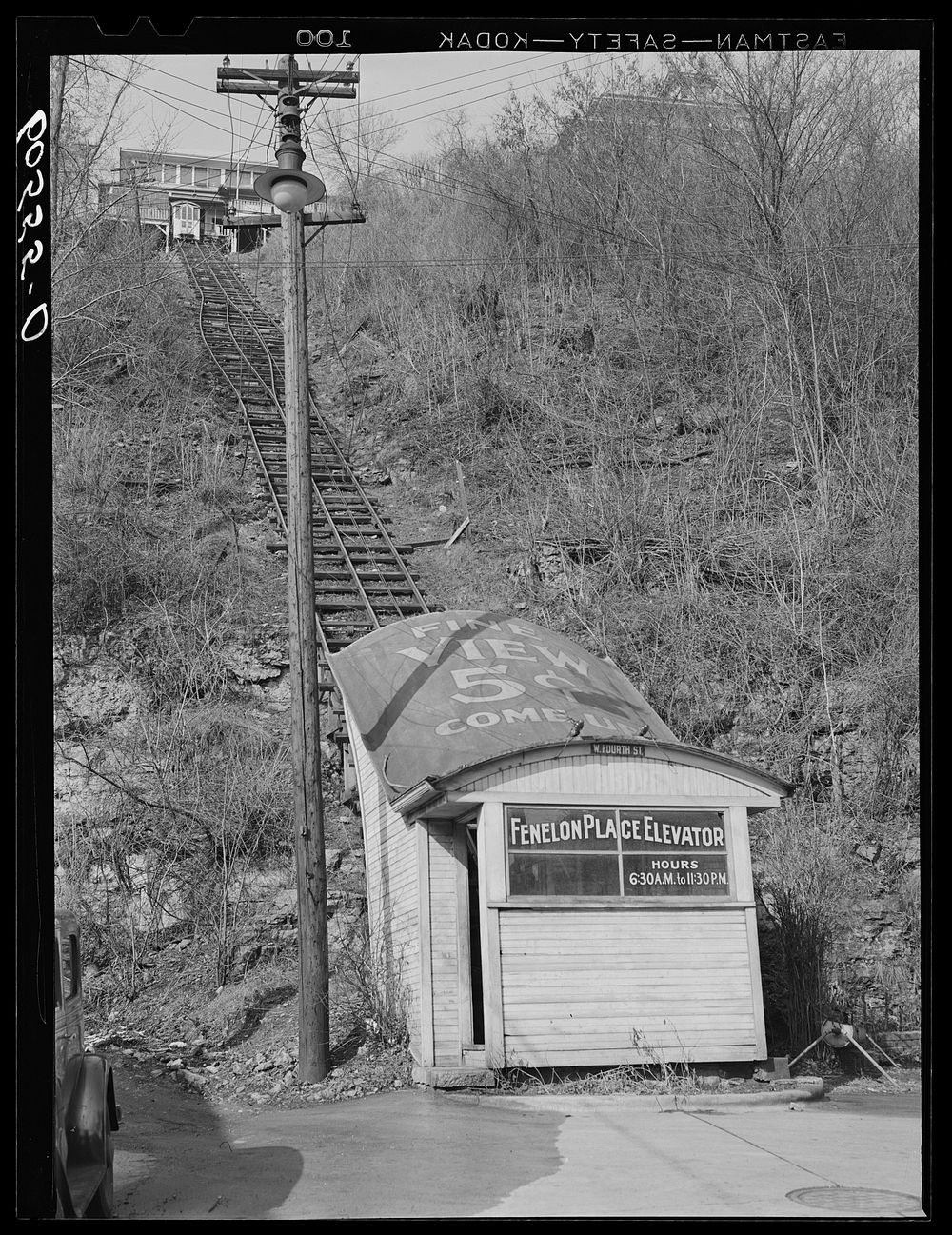 Elevator which ascends from downtown district to residential section of bluffs. Dubuque, Iowa. Sourced from the Library of…