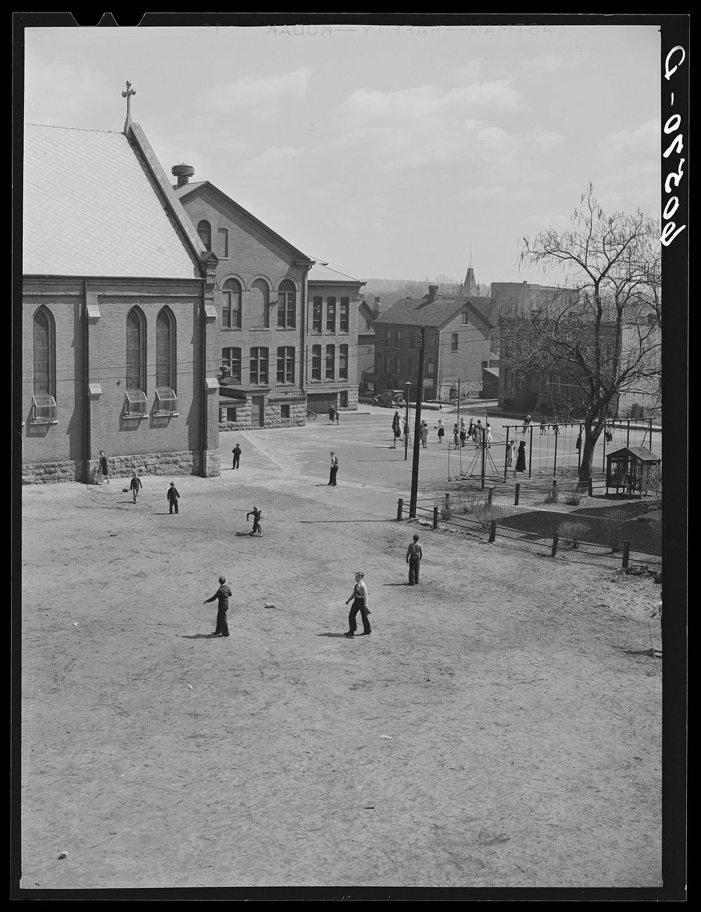 Catholic church and school yard. Dubuque, Iowa. Sourced from the Library of Congress.