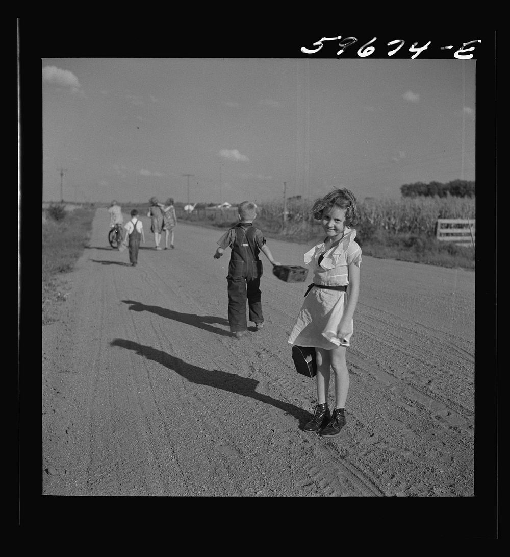 [Untitled photo, possibly related to: Children coming home from school. Two Rivers Non-Stock Cooperative Company, FSA (Farm…