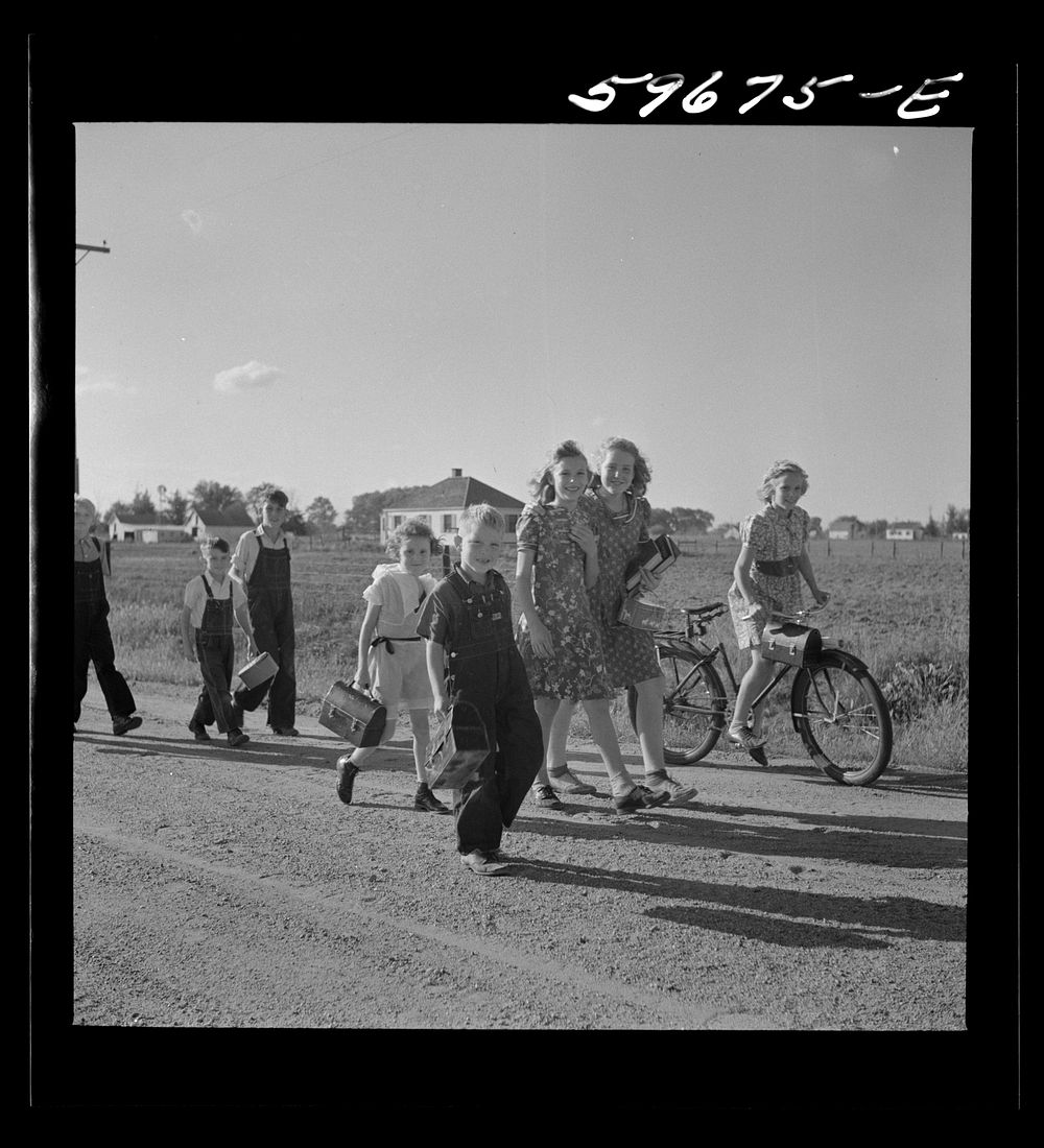 Children coming home from school. Two Rivers Non-Stock Cooperative Company, FSA (Farm Security Administration) co-op.…