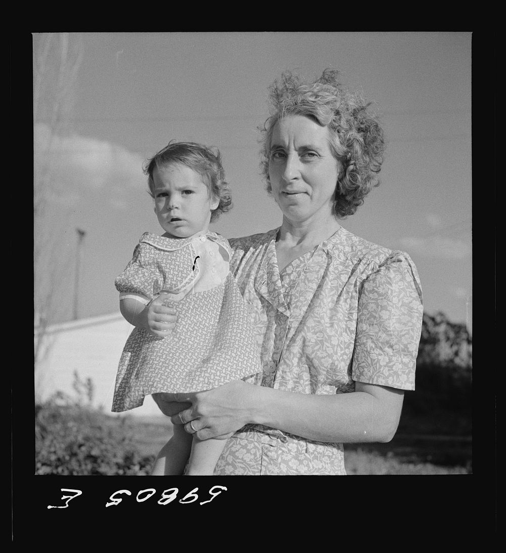 Wife and child of one of the members of the Two Rivers Cooperative Company, FSA (Farm Security Administration) project, with…
