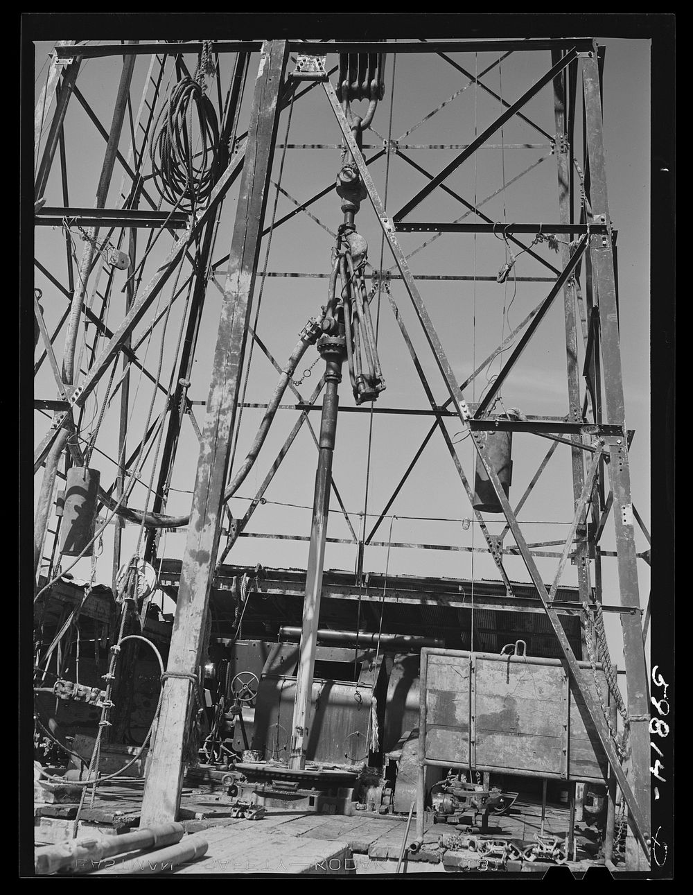 [Untitled photo, possibly related to: Preparing to drill an oil well in Goodrich field of Continental oil company. Valley…