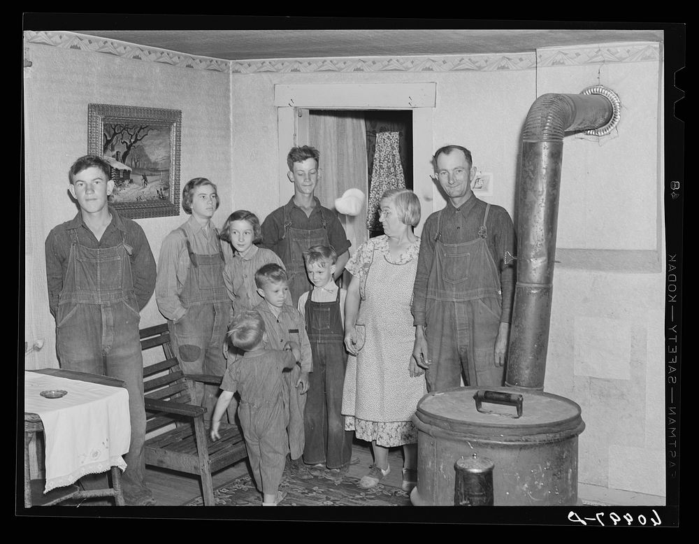 FSA (Farm Security Administration) rehabilitation borrower with his family. Crawford County, Illinois. Sourced from the…