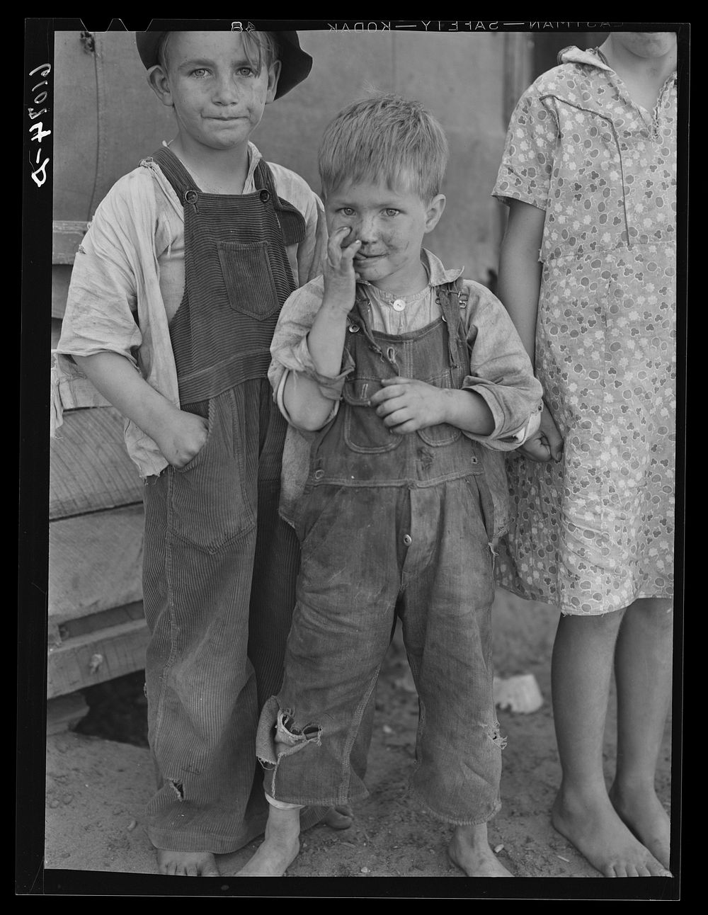 Children of family living on the other side of the levee, along Mississippi riverbottoms. They will move to one of the new…