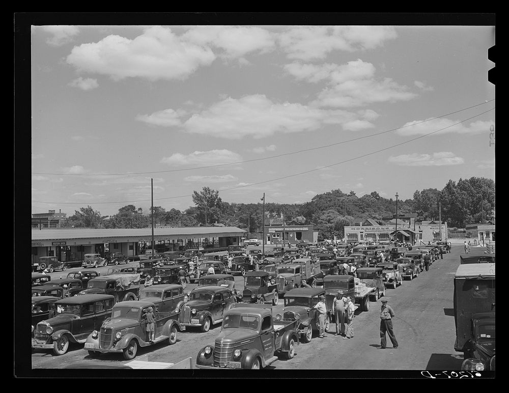 Fruit market. Benton Harbor, Michigan. Growers pay ten cents to drive truck through the market. If produce is not sold at…
