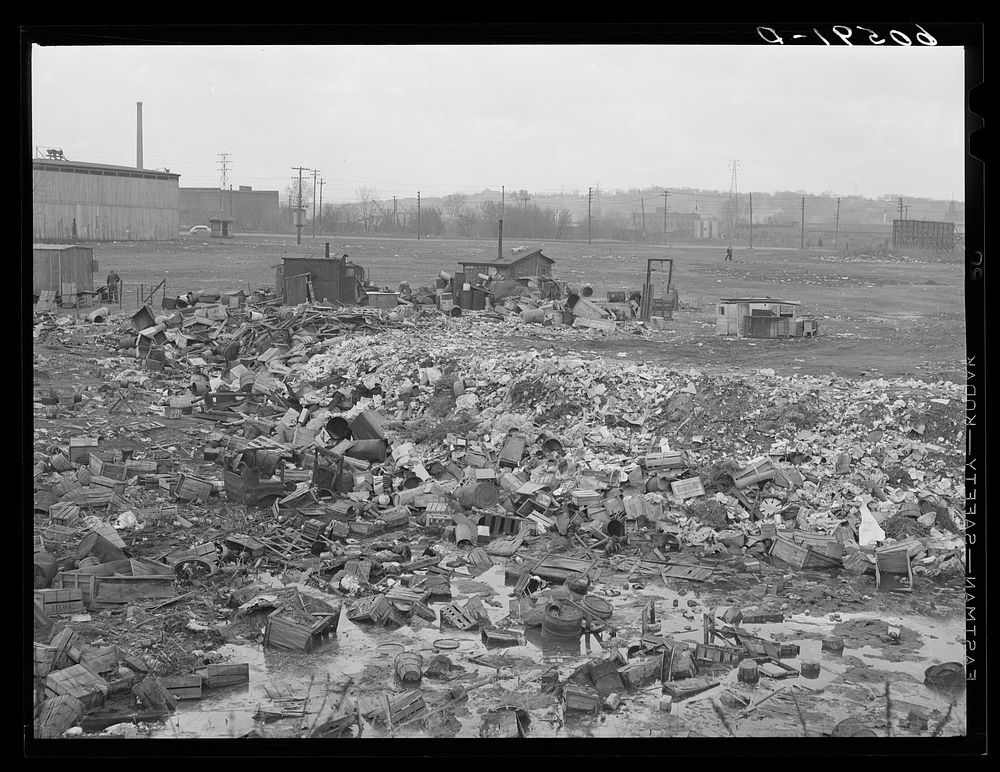 City dump. Dubuque, Iowa. In the background are shacks occupied by men who salvage anything marketable they can find in the…