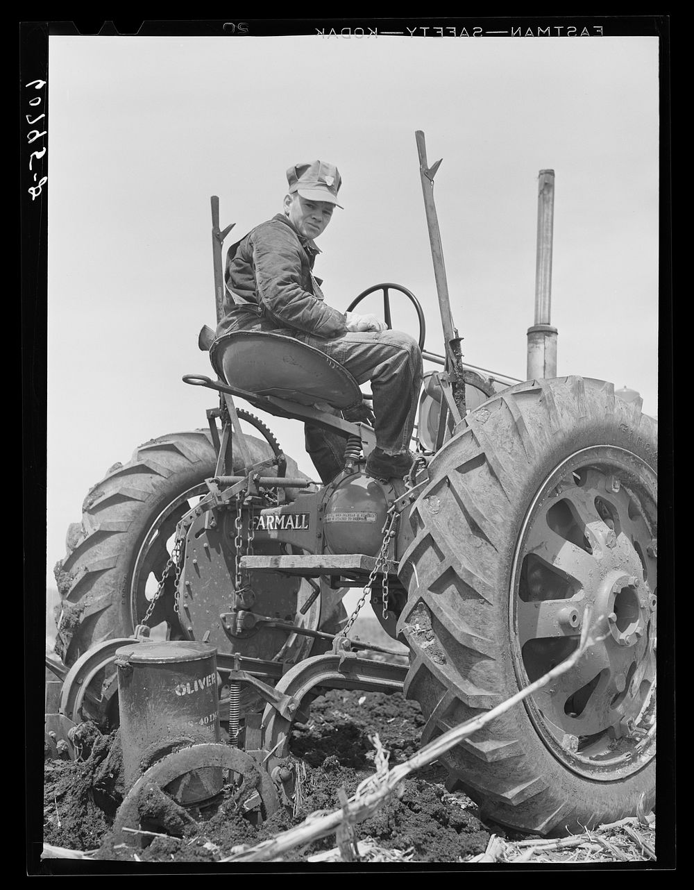 Two-row tractor corn planter. Monona County, Iowa. Sourced from the Library of Congress.