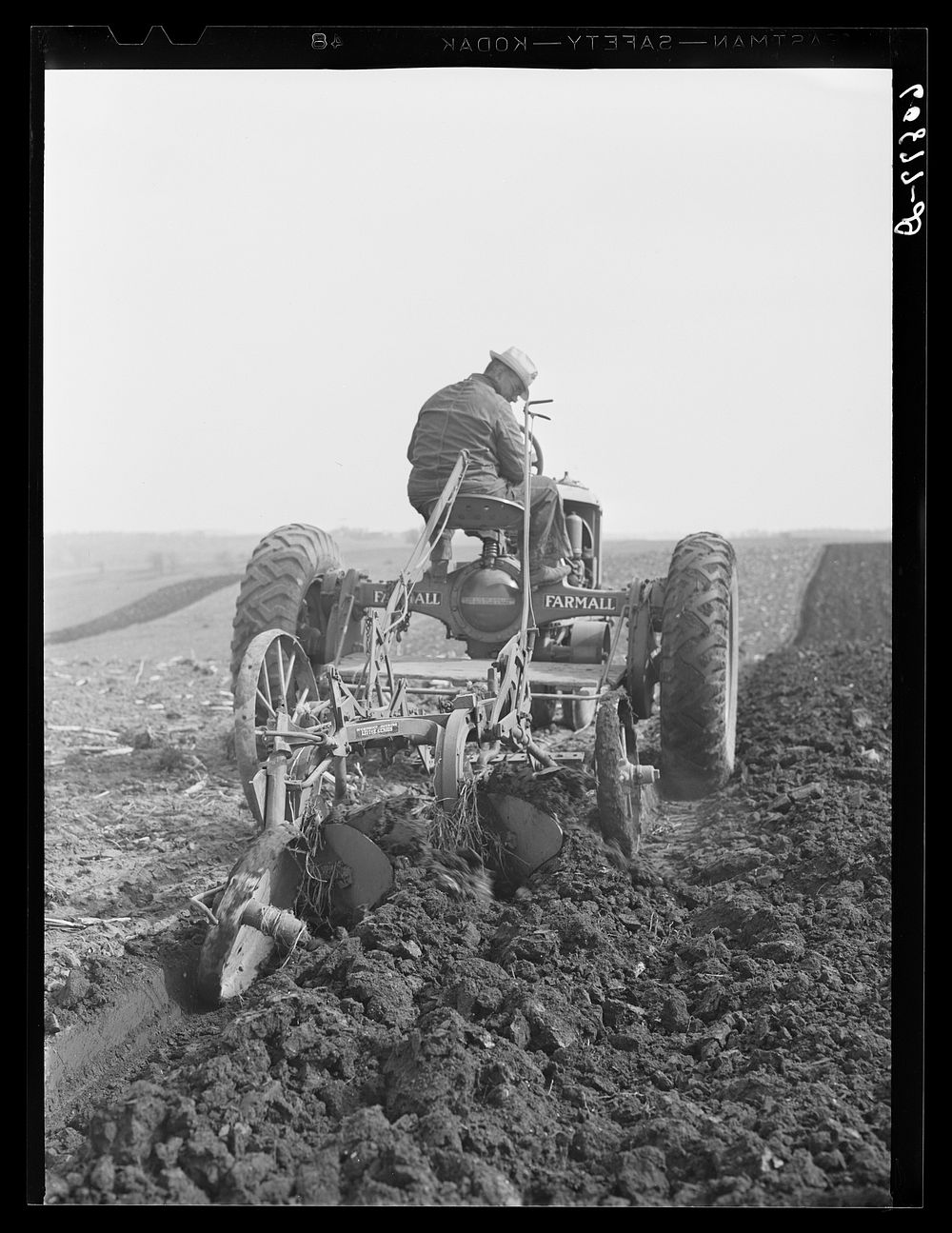 Plowing with tractor. Jasper County, Iowa. Sourced from the Library of Congress.