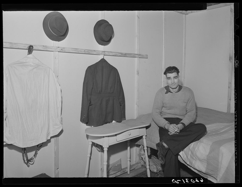 Mechanic at powder plant in his room in basement of Mr. Tilly's furniture store. Radford, Virginia. Sourced from the Library…