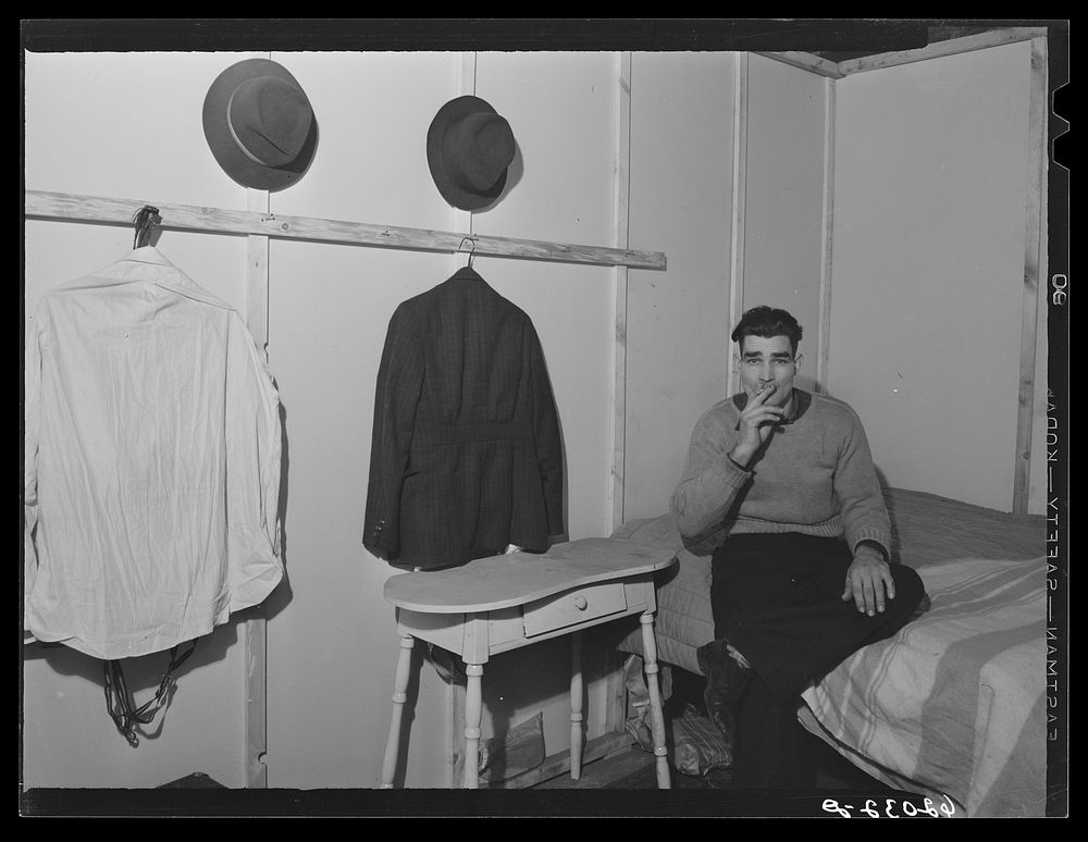 [Untitled photo, possibly related to: Mechanic at powder plant in his room in basement of Mr. Tilly's furniture store.…