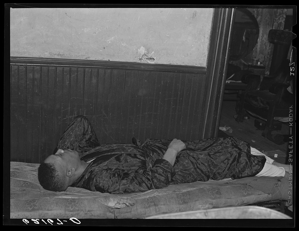 Steelworker who sleeps during the day. He is on the night shift, J & L (Jones and Laughlin) plant. Aliquippa, Pennsylvania.…