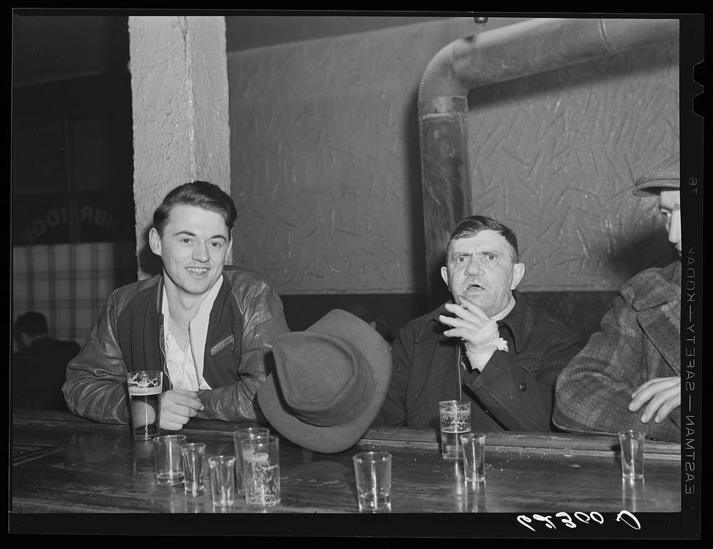 Steelworkers in beer parlor. Ambridge, Pennsylvania. Sourced from the Library of Congress.