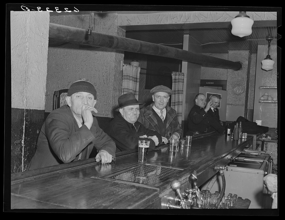 Steelworkers in corner beer parlor. Ambridge, Pennsylvania. Sourced from the Library of Congress.