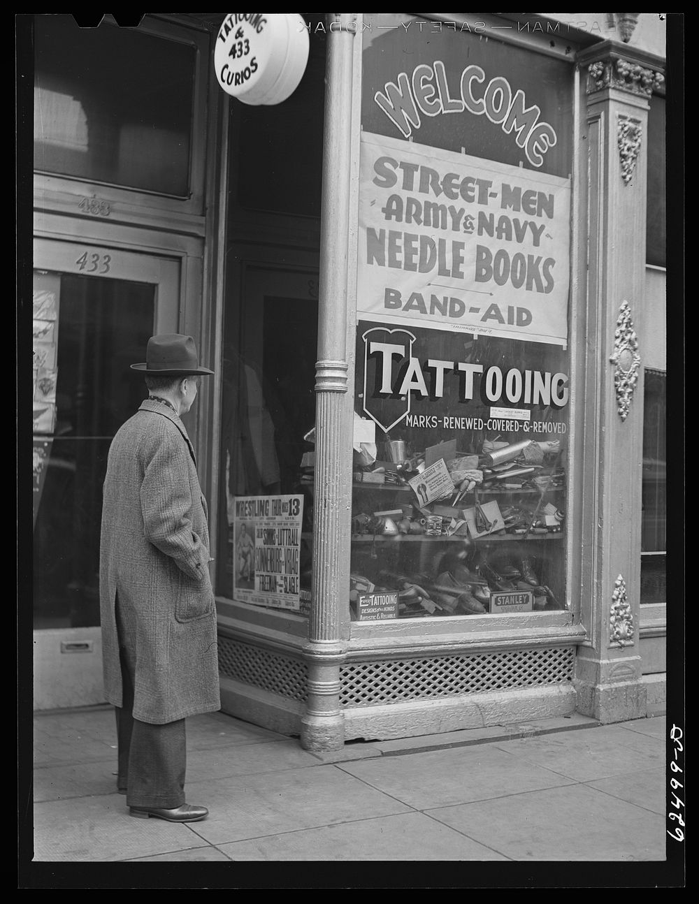 Tatooing shop on West Main Street. Norfolk, Virginia. Sourced from the Library of Congress.