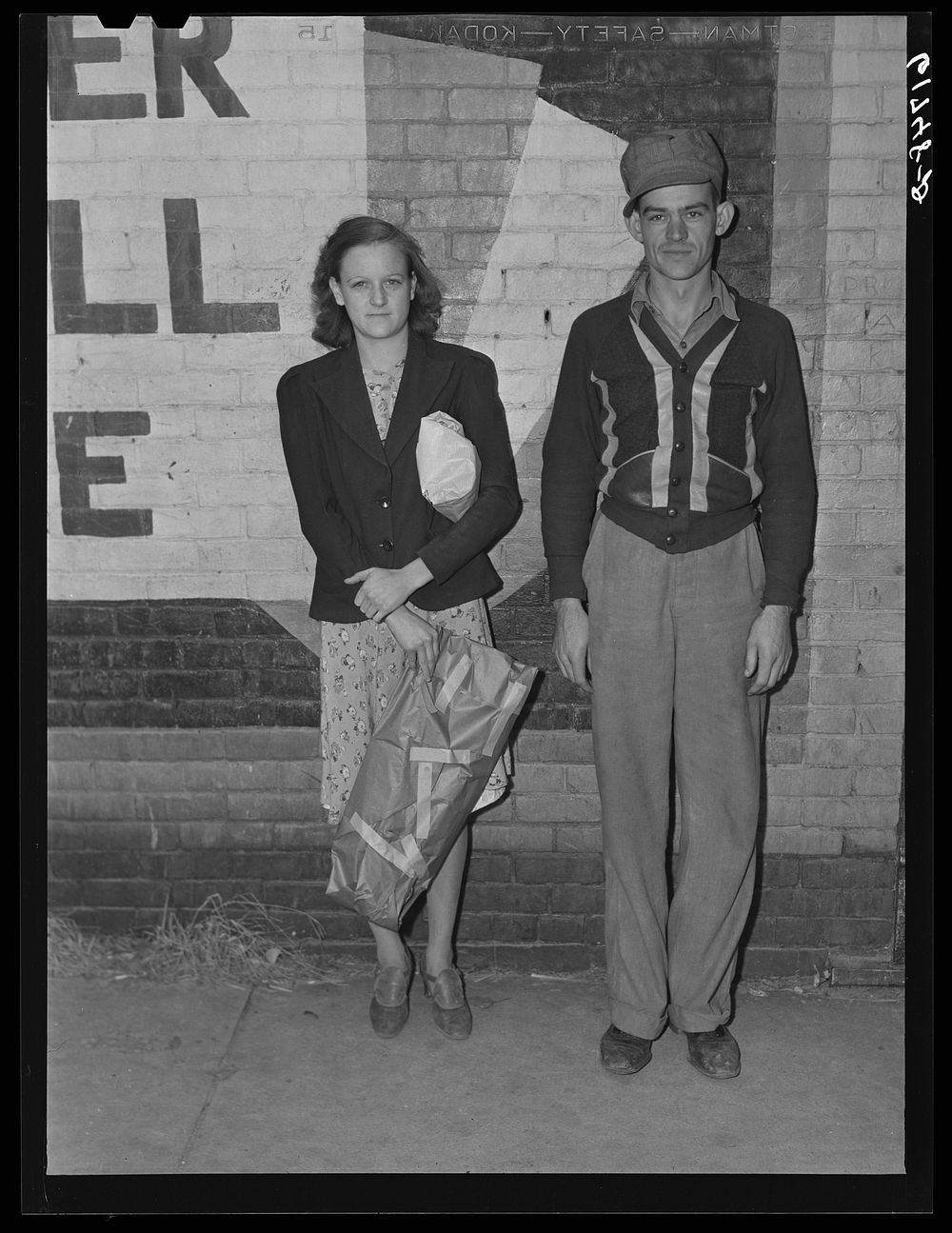 Farm couple in town. Malden, Missouri. Sourced from the Library of Congress.
