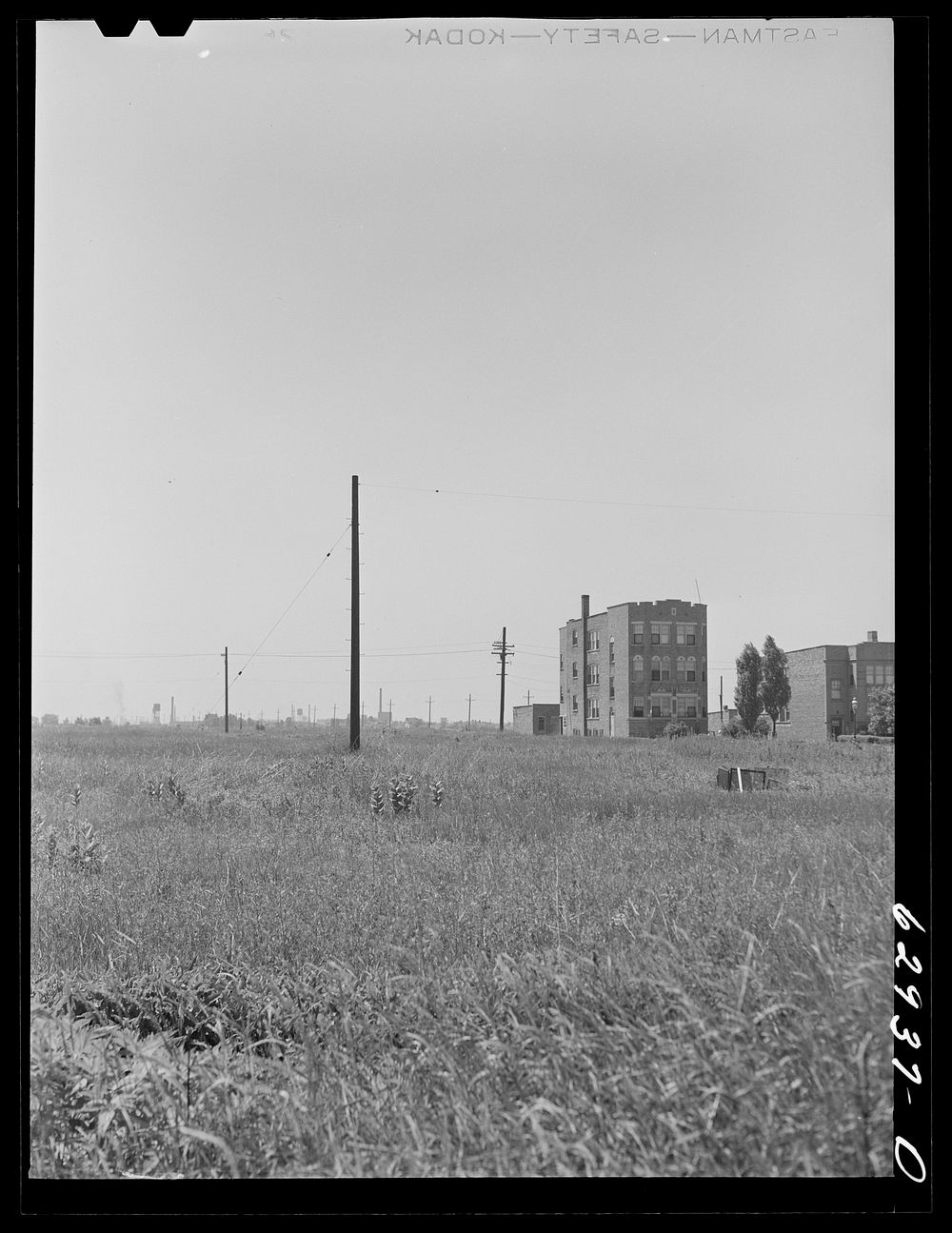 [Untitled photo, possibly related to: Apartment dwellings on outskirts of Chicago, Illinois]. Sourced from the Library of…