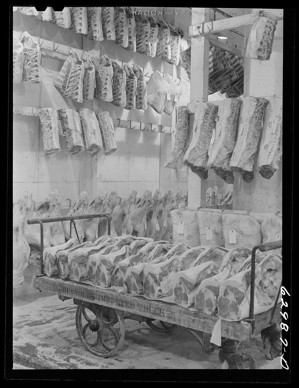Meat in cold storage at Davidson Meat Company, suppliers of hotels, restaurants, etc. Chicago, Illinois. Sourced from the…