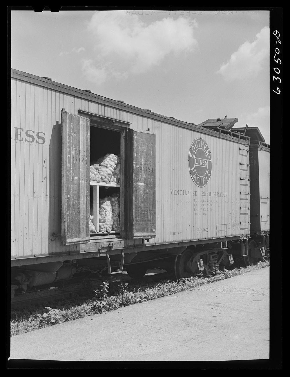 [Untitled photo, possibly related to: Double deck storage of carload of onions at terminal. Chicago, Illinois]. Sourced from…