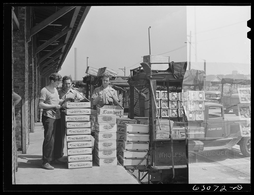 [Untitled photo, possibly related to: Loading crates of fruits into truck at fruit terminal. Chicago, Illinois]. Sourced…