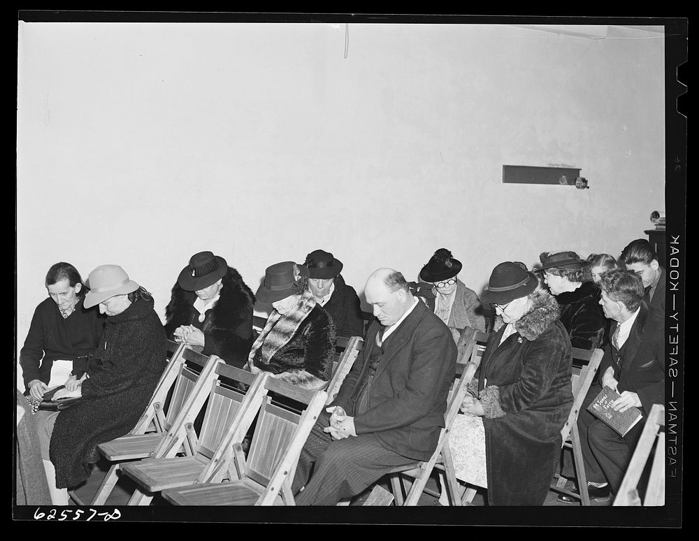 Prayer. Evening service of Helping Hand Mission. Portsmouth, Virginia. Sourced from the Library of Congress.