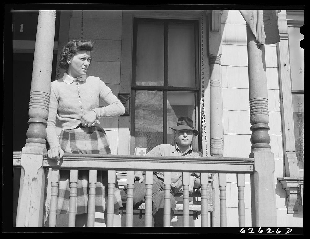 Front porch, rooming house. Portsmouth, Virginia. Sourced from the Library of Congress.