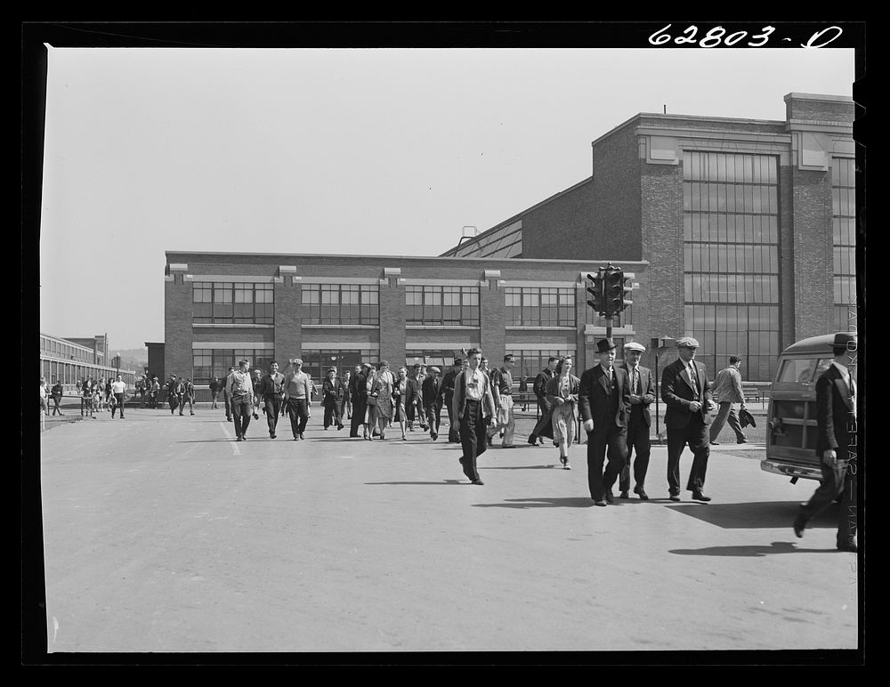 [Untitled photo, possibly related to: General Electric workers leaving the plant at 4:00 p.m. Another shift comes on…