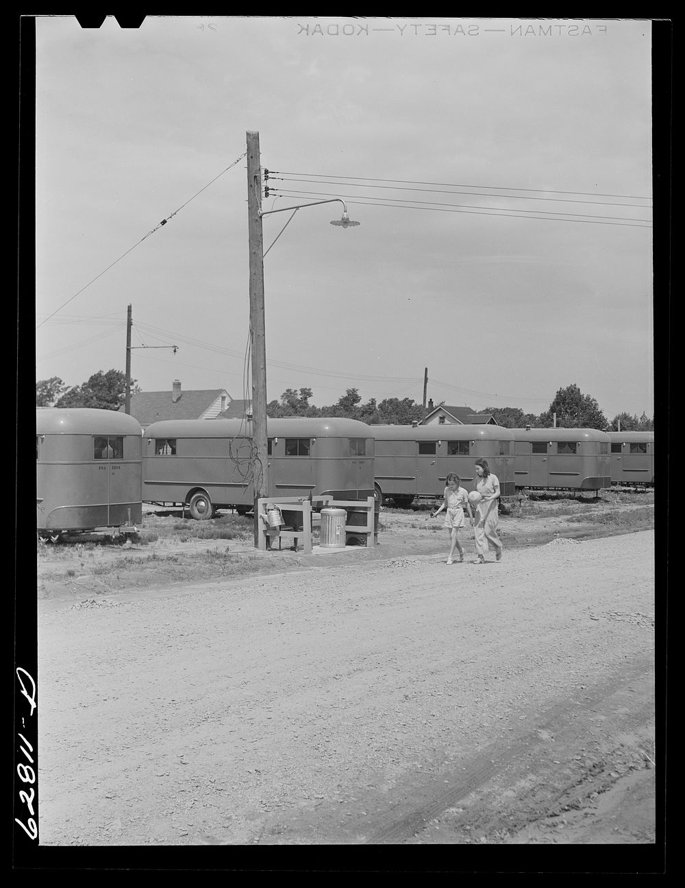 [Untitled photo, possibly related to: Each group of ten trailers in the FSA (Farm Security Administration) camp at Erie has…