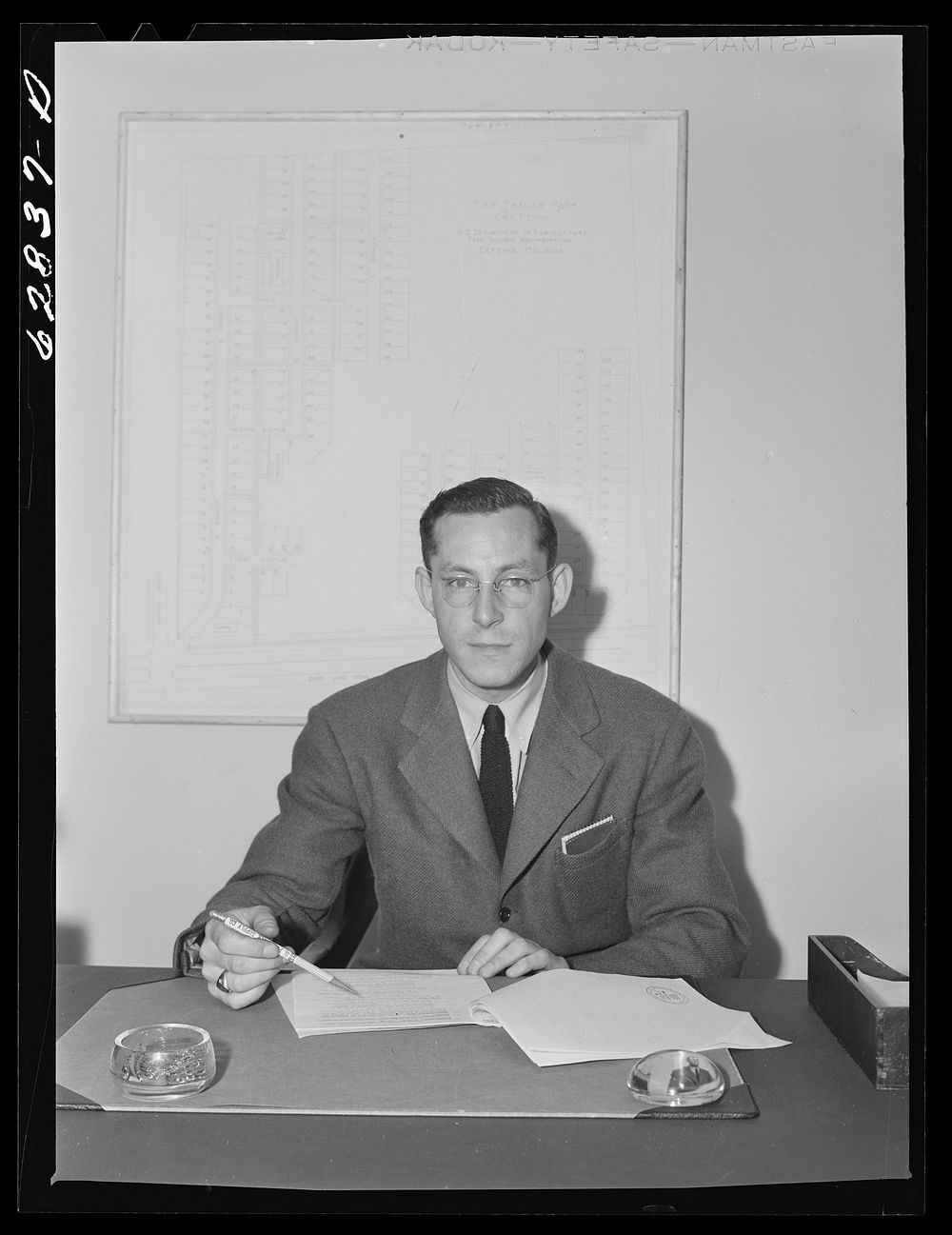 Milton B. Ackerman, manager of FSA (Farm Security Administration) trailer camp for defense workers at Erie, Pennsylvania.…