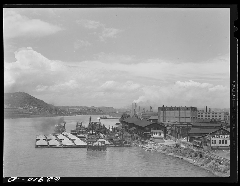 Sand barges on the river. Pittsburgh, Pennsylvania. Sourced from the Library of Congress.