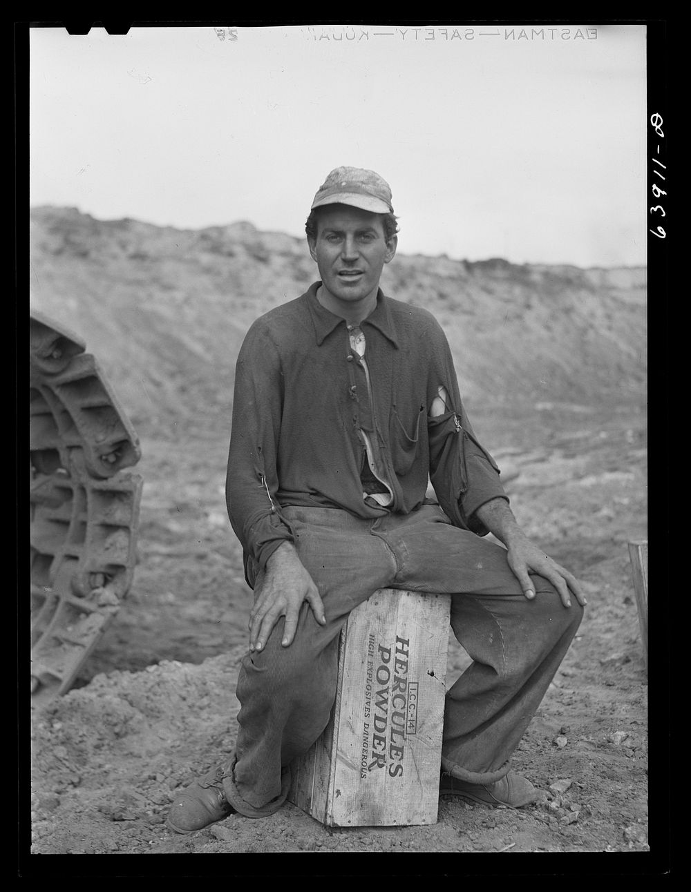 Member of blasting crew at Danube Mine near Bovey, Minnesota. Sourced from the Library of Congress.