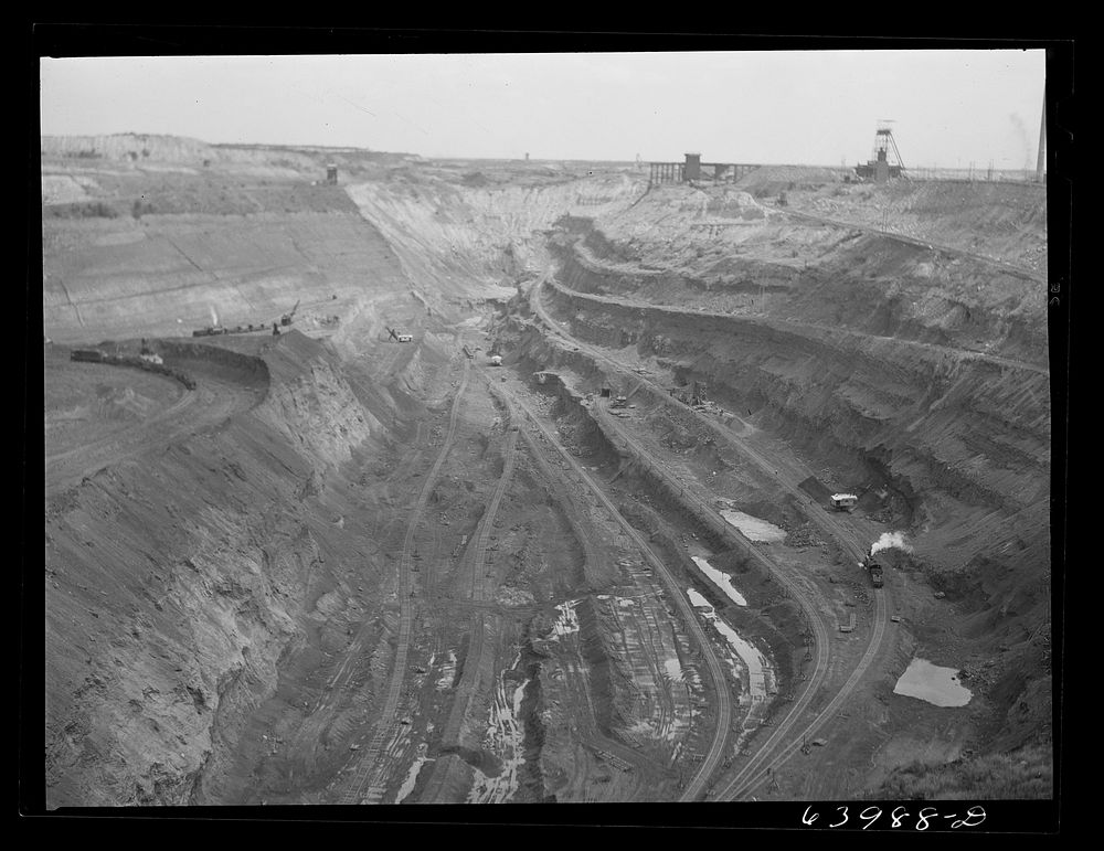 [Untitled photo, possibly related to: One end of the largest open pit iron mine in the world. The Hull-Rust-Mahoning…