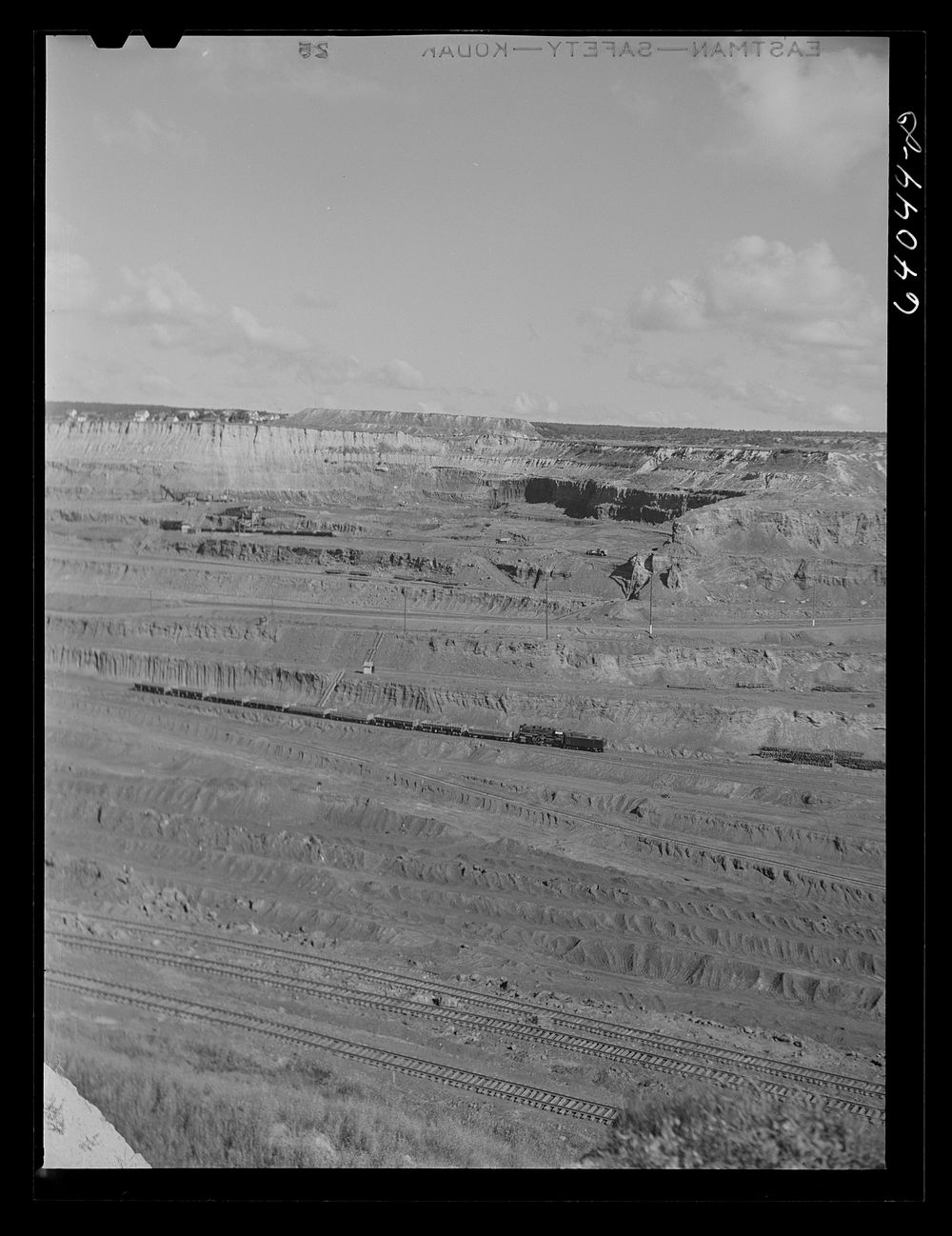 [Untitled photo, possibly related to: World's largest open pit iron mine, the Hull-Rust-Mahoning. Hibbing, Minnesota].…