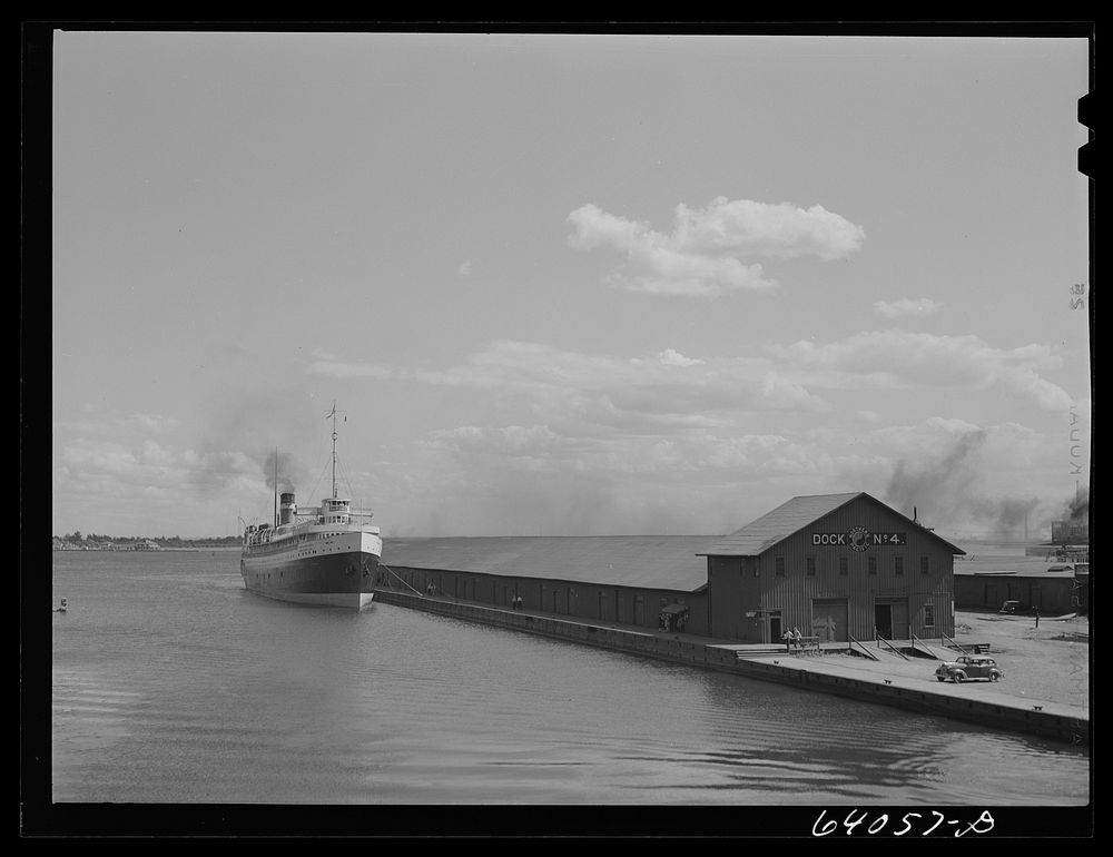 Great Lakes freighter which has just come in light to Northern Pacific docks. Duluth, Minnesota. Sourced from the Library of…