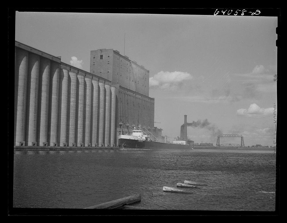 [Untitled photo, possibly related to: Loading grain boat. Duluth, Minnesota]. Sourced from the Library of Congress.