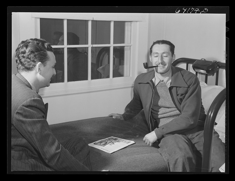 [Untitled photo, possibly related to: Defense worker reading a letter from home. He works at the proving grounds in…