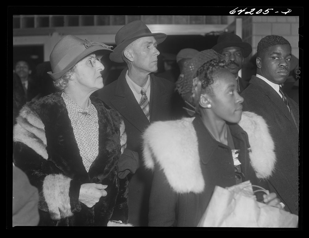 Washington, D.C. Greyhound bus terminal on the day before Christmas. Waiting to board the bus to Richmond. Sourced from the…