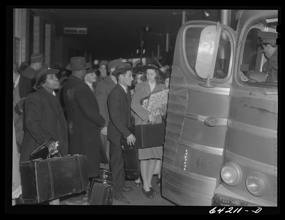 Washington, D.C. Greyhound bus terminal on the day before Christmas. Boarding a bus to Richmond. Sourced from the Library of…