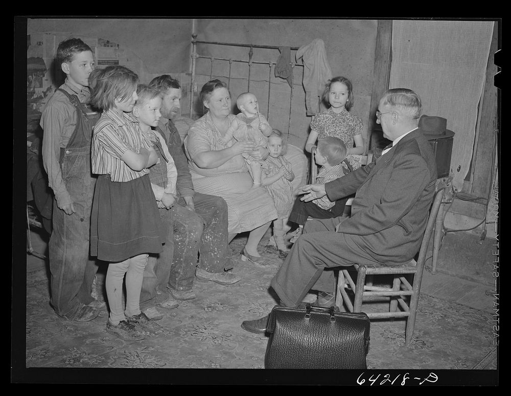 [Untitled photo, possibly related to: Scott County, Missouri. Country doctor visiting farm family]. Sourced from the Library…