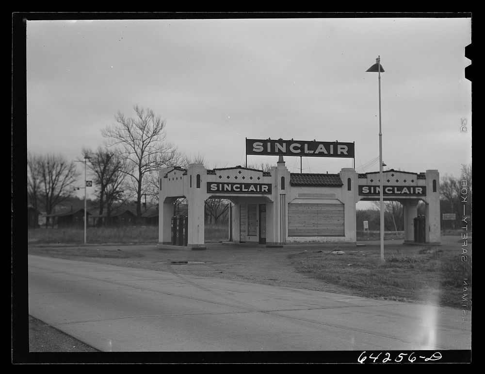 Kansas City, Missouri. Closed gas station on highway leading into Kansas City, Missouri. Sourced from the Library of…