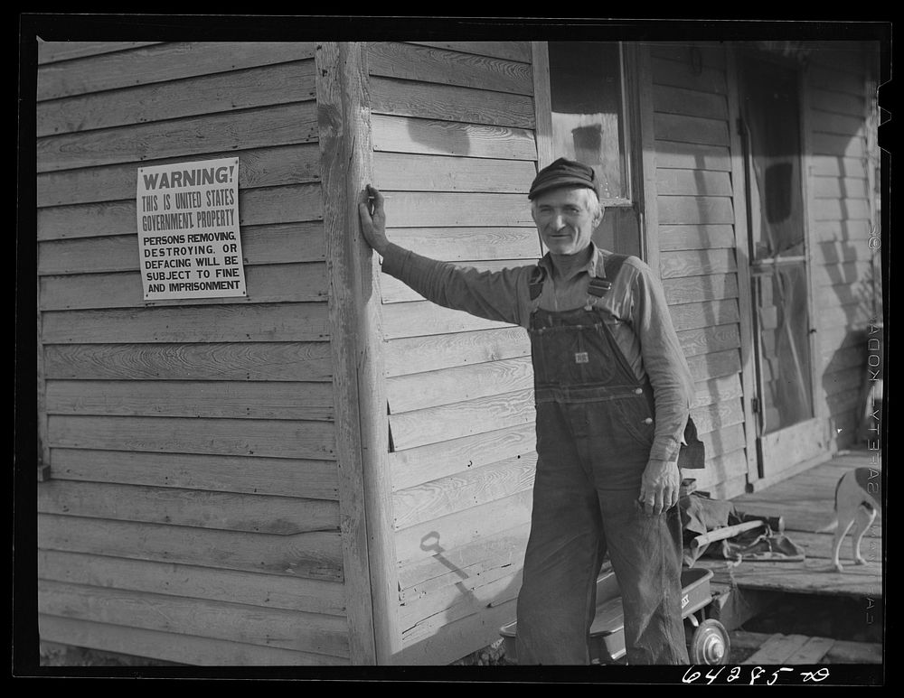 Newton County, Missouri. Camp Crowder area. James Mallory, Ozark farmer whose land has been bought by the Army for…